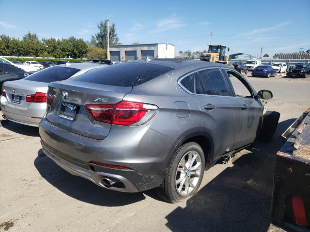 Photo 4 from auction – 2016 BMW X6 XDRIVE3 with VIN 5UXKU2C53G0N79803