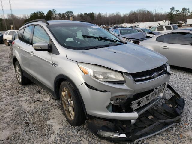 FORD ESCAPE TIT 2014 with VIN 1FMCU0JX2EUA53601 - Photo from auction