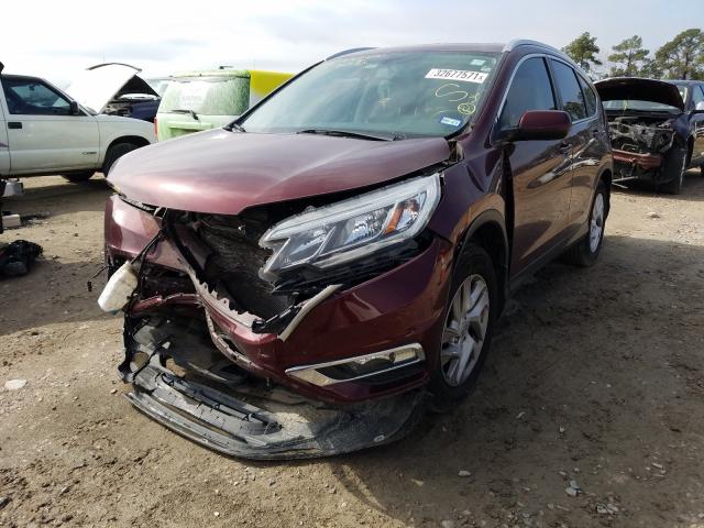 Photo 2 from auction – 2016 HONDA CR-V with VIN 2HKRM3H70GH529590