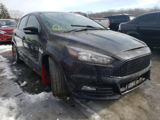 FORD FOCUS ST 2017 with VIN 1FADP3L92HL330585 - Photo from auction