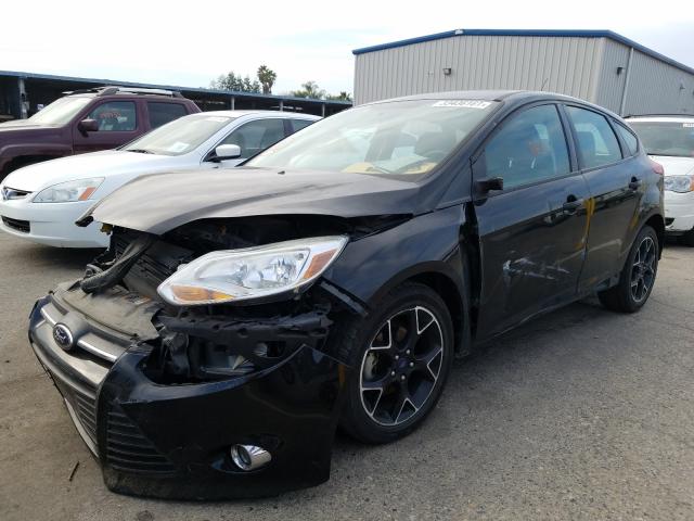 Photo 2 from auction – 2014 FORD FOCUS SE with VIN 1FADP3K28EL282090