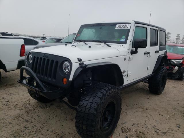 Photo 2 from auction – 2012 JEEP WRANGLER U with VIN 1C4HJWDG2CL290044