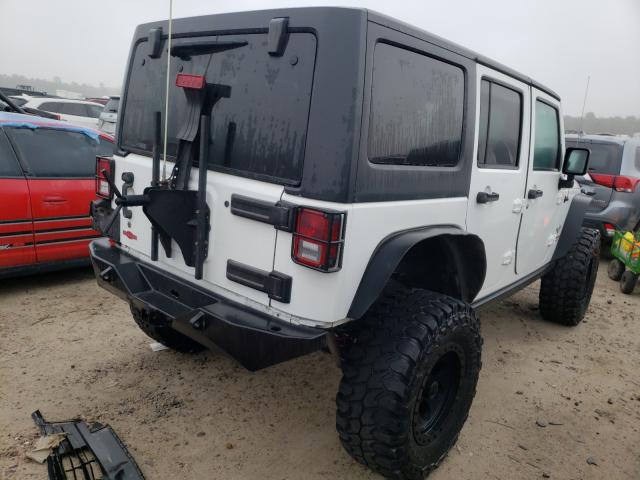 Photo 4 from auction – 2012 JEEP WRANGLER U with VIN 1C4HJWDG2CL290044