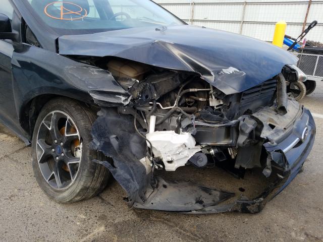 Photo 9 from auction – 2014 FORD FOCUS SE with VIN 1FADP3K28EL282090
