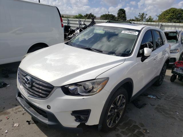 Photo 2 from auction – 2016 MAZDA CX-5 GT with VIN JM3KE2DY3G0681424