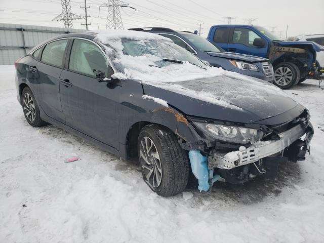 HONDA CIVIC EX 2018 with VIN 19XFC2F78JE004713 - Photo from auction