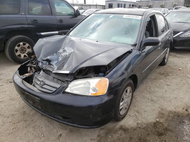 Photo 2 from auction – 2003 HONDA CIVIC LX with VIN 2HGES16573H532002