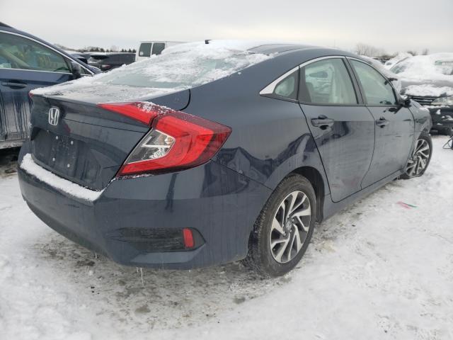 Photo 4 from auction – 2018 HONDA CIVIC EX with VIN 19XFC2F78JE004713