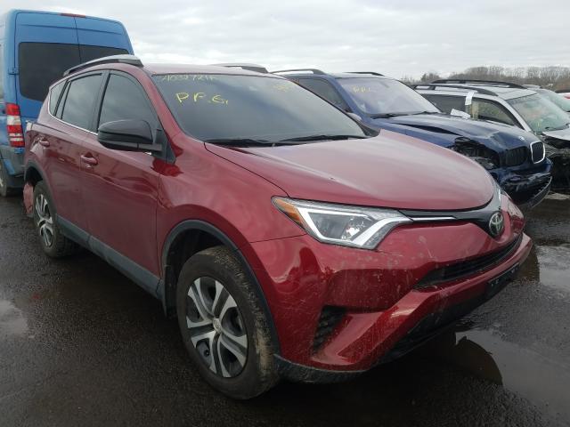 Photo 1 from auction – 2018 TOYOTA RAV4 LE with VIN 2T3BFREVXJW749689