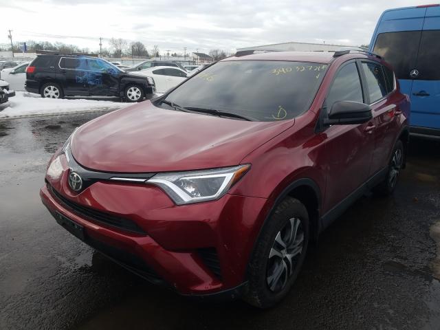 Photo 2 from auction – 2018 TOYOTA RAV4 LE with VIN 2T3BFREVXJW749689