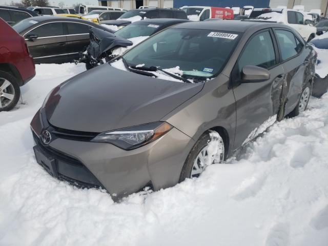 Photo 2 from auction – 2017 TOYOTA COROLLA L with VIN 5YFBURHE2HP704378
