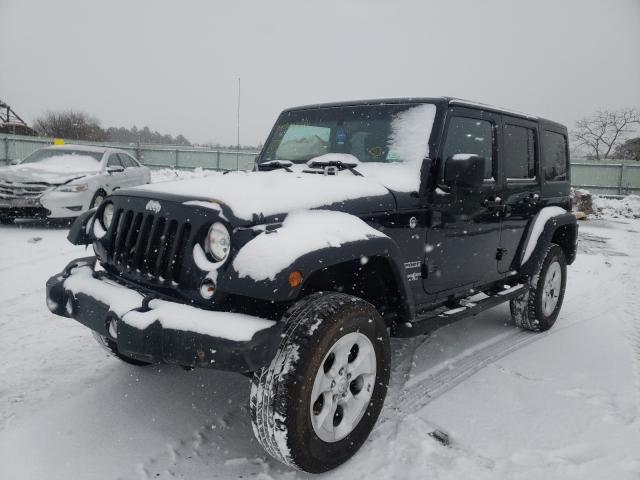 Photo 2 from auction – 2014 JEEP WRANGLER U with VIN 1C4BJWDGXEL227184