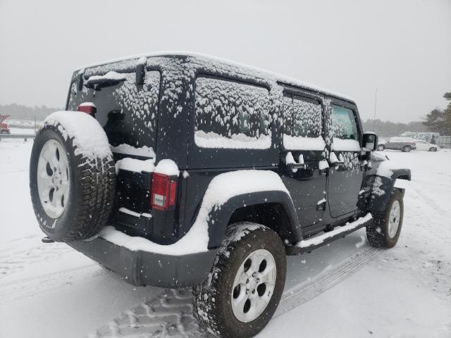 Photo 4 from auction – 2014 JEEP WRANGLER U with VIN 1C4BJWDGXEL227184