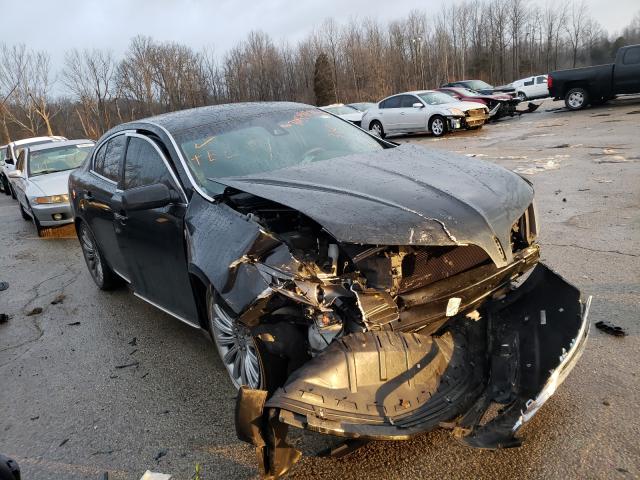 LINCOLN MKS 2014 with VIN 1LNHL9DK0EG610890 - Photo from auction