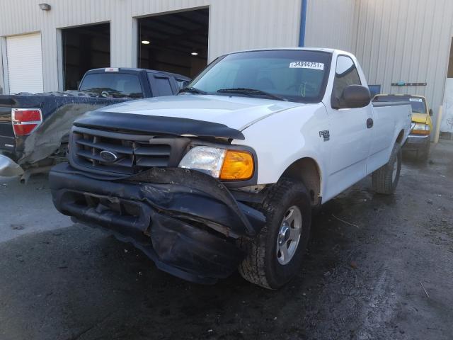 Photo 2 from auction – 2004 FORD F150 HERIT with VIN 2FTRF18W74CA64832