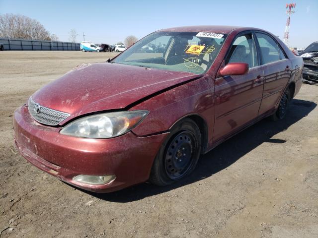 Photo 2 from auction – 2002 TOYOTA CAMRY LE with VIN JTDBE32K220102042