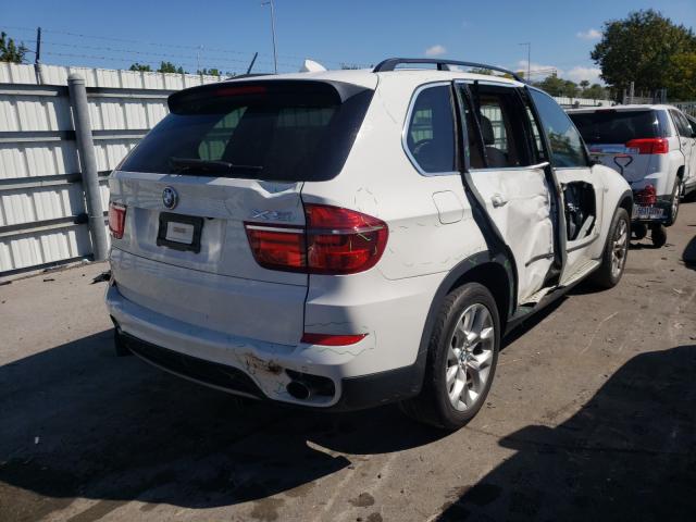 Photo 4 from auction – 2013 BMW X5 XDRIVE3 with VIN 5UXZV4C50D0B03983