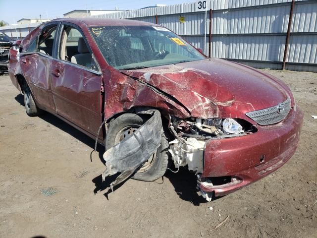 TOYOTA CAMRY LE 2002 with VIN JTDBE32K220102042 - Photo from auction