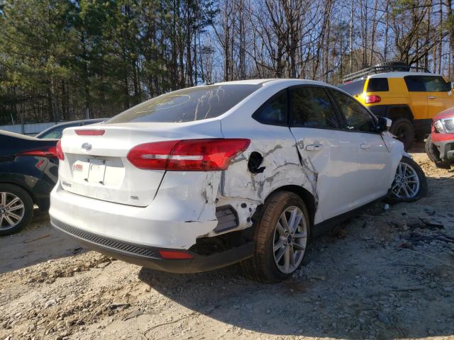 Photo 4 from auction – 2018 FORD FOCUS SE with VIN 1FADP3F22JL295499