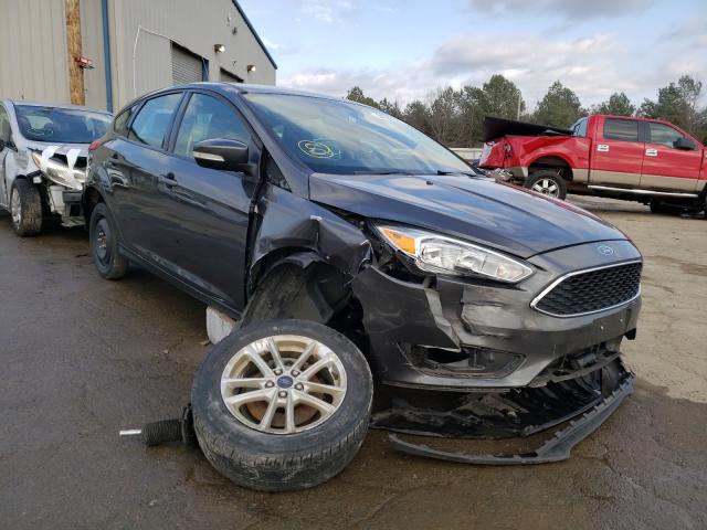FORD FOCUS SE 2015 with VIN 1FADP3K25FL211382 - Photo from auction