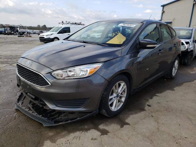 Photo 2 from auction – 2015 FORD FOCUS SE with VIN 1FADP3K25FL211382