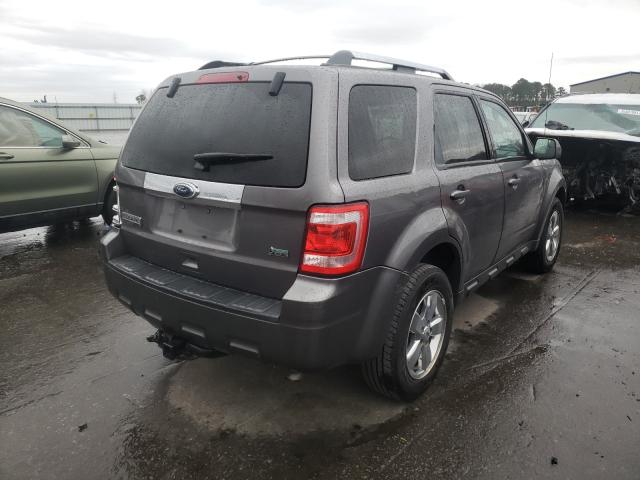 Photo 4 from auction – 2010 FORD ESCAPE LIM with VIN 1FMCU0EG5AKC44543