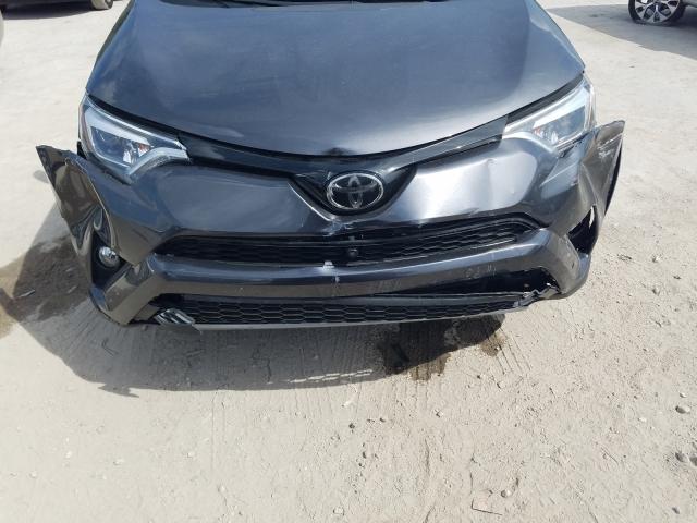 Photo 9 from auction – 2018 TOYOTA RAV4 SE with VIN JTMNFREV8JJ151239