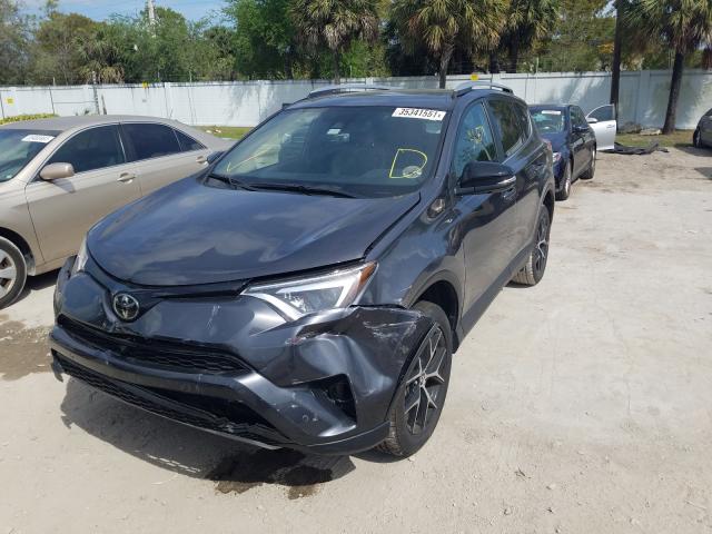 Photo 2 from auction – 2018 TOYOTA RAV4 SE with VIN JTMNFREV8JJ151239