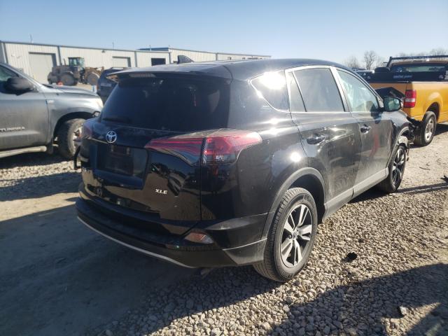 Photo 4 from auction – 2018 TOYOTA RAV4 with VIN 2T3WFREV9JW477556