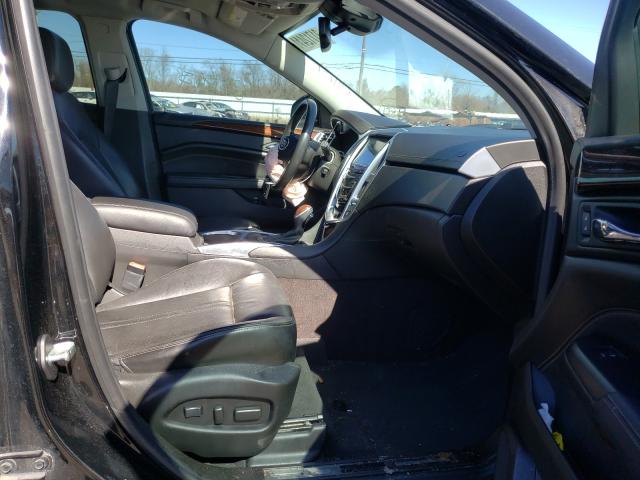 Photo 5 from auction – 2014 CADILLAC SRX LUXURY with VIN 3GYFNBE39ES567151