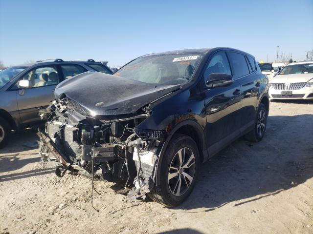Photo 2 from auction – 2018 TOYOTA RAV4 with VIN 2T3WFREV9JW477556