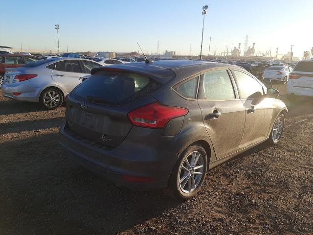 Photo 4 from auction – 2016 FORD FOCUS SE with VIN 1FADP3K29GL395727