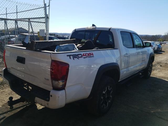 Photo 4 from auction – 2017 TOYOTA TACOMA DOU with VIN 3TMCZ5AN8HM090727