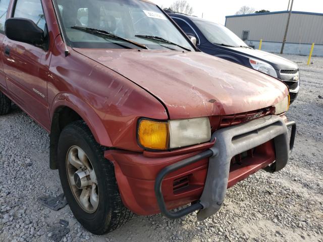 Photo 9 from auction – 1999 ISUZU RODEO S with VIN 4S2CK58W4X4383607