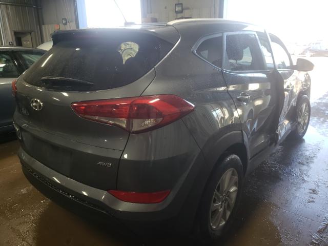 Photo 4 from auction – 2016 HYUNDAI TUCSON LIM with VIN KM8J3CA41GU105661