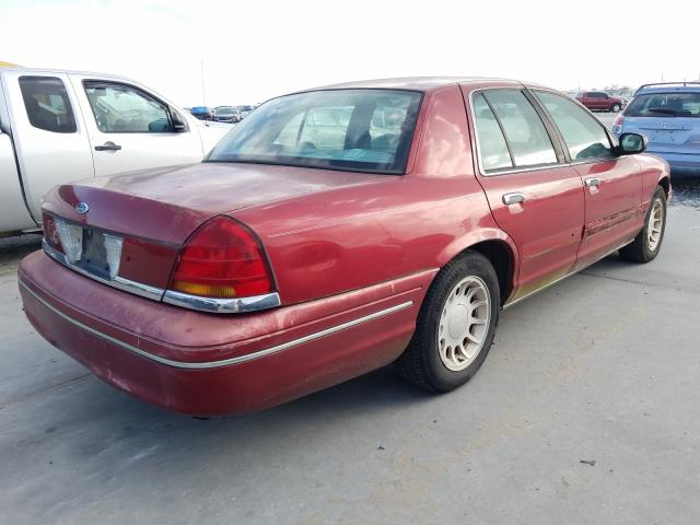 Photo 4 from auction – 2000 FORD CROWN VICT with VIN 2FAFP74W6YX121714