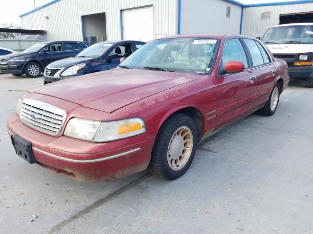 Photo 2 from auction – 2000 FORD CROWN VICT with VIN 2FAFP74W6YX121714