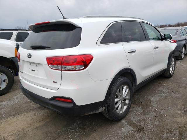 Photo 4 from auction – 2016 KIA SORENTO LX with VIN 5XYPG4A38GG170556