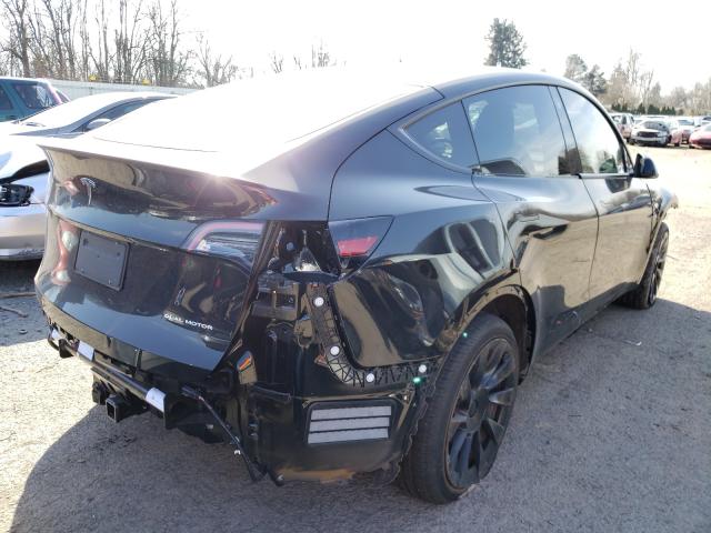 Photo 4 from auction – 2021 TESLA MODEL Y with VIN 5YJYGDEE4MF123110