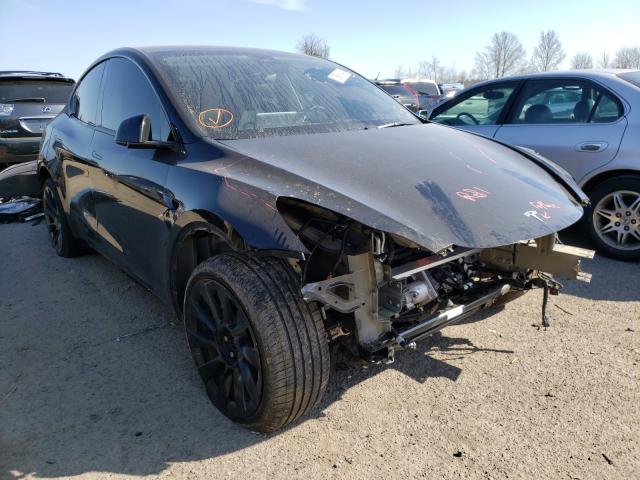 TESLA MODEL Y 2021 with VIN 5YJYGDEE4MF123110 - Photo from auction