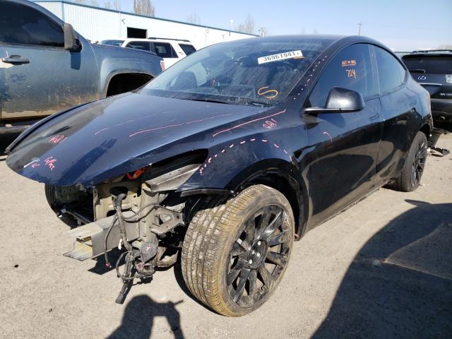 Photo 2 from auction – 2021 TESLA MODEL Y with VIN 5YJYGDEE4MF123110