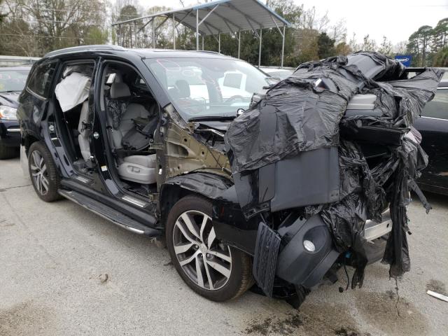 Photo 1 from auction – 2016 HONDA PILOT TOUR with VIN 5FNYF5H92GB002863