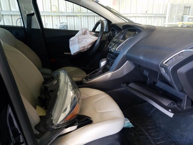 Photo 5 from auction – 2015 FORD FOCUS TITA with VIN 1FADP3J28FL259606