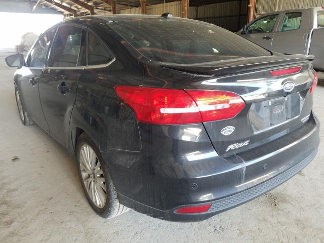 Photo 3 from auction – 2015 FORD FOCUS TITA with VIN 1FADP3J28FL259606