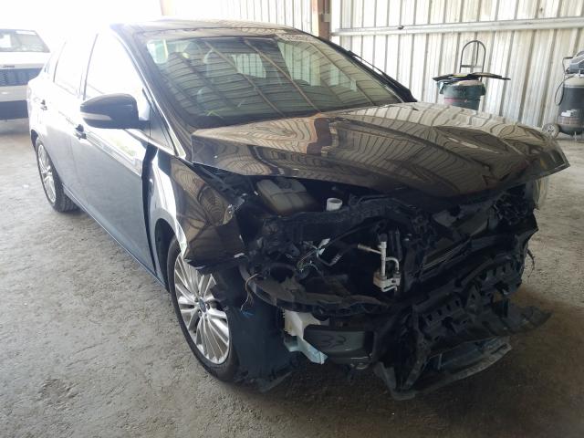 Photo 1 from auction – 2015 FORD FOCUS TITA with VIN 1FADP3J28FL259606