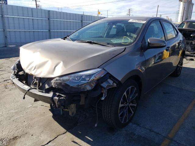 Photo 2 from auction – 2017 TOYOTA COROLLA L with VIN 5YFBURHE3HP727975