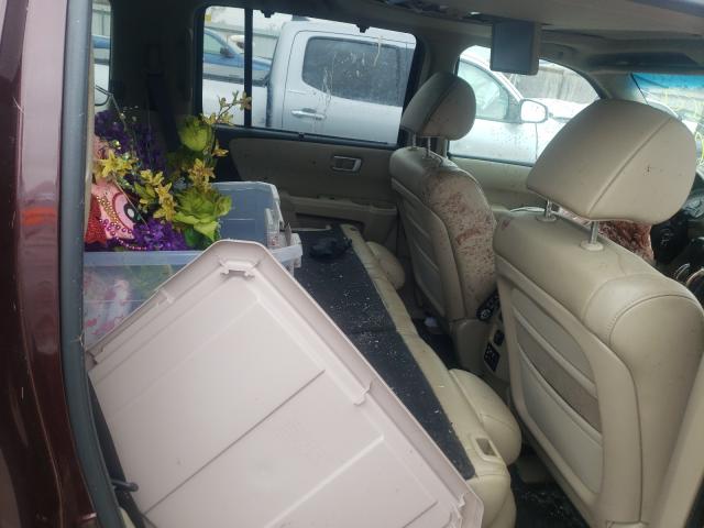 Photo 6 from auction – 2011 HONDA PILOT TOUR with VIN 5FNYF4H90BB062059