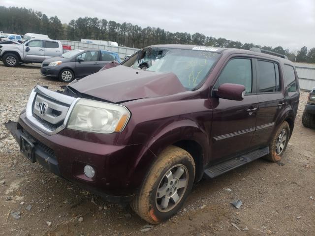 Photo 2 from auction – 2011 HONDA PILOT TOUR with VIN 5FNYF4H90BB062059
