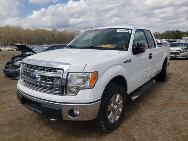 Photo 2 from auction – 2014 FORD F150 SUPER with VIN 1FTFX1EF1EKG54557