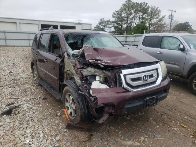 HONDA PILOT TOUR 2011 with VIN 5FNYF4H90BB062059 - Photo from auction